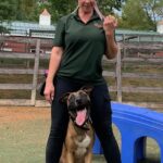 Image of our dog trainer Davyda training a dog